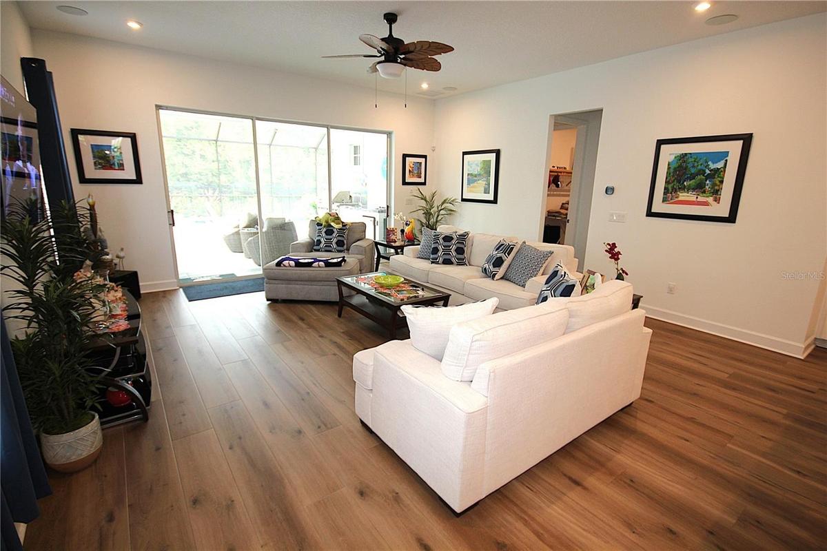 EXPANSIVE SLIDER TO OUTDOOR KITCHEN AND POOL DECK