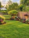 Fenced+flower filled beds!