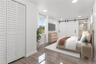 Second primary bedroom, bottom floor, virtually staged