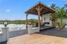 Custom Covered Deck overlooking Green Lake. (Ski and Boating allowed)