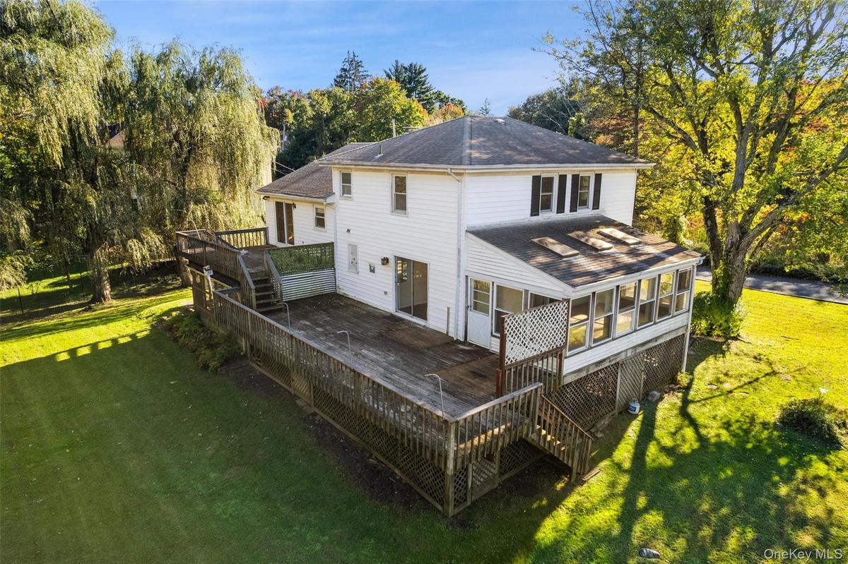 The expansive setting invites imagination—whether enhancing the existing residence or exploring the property's broader potential.