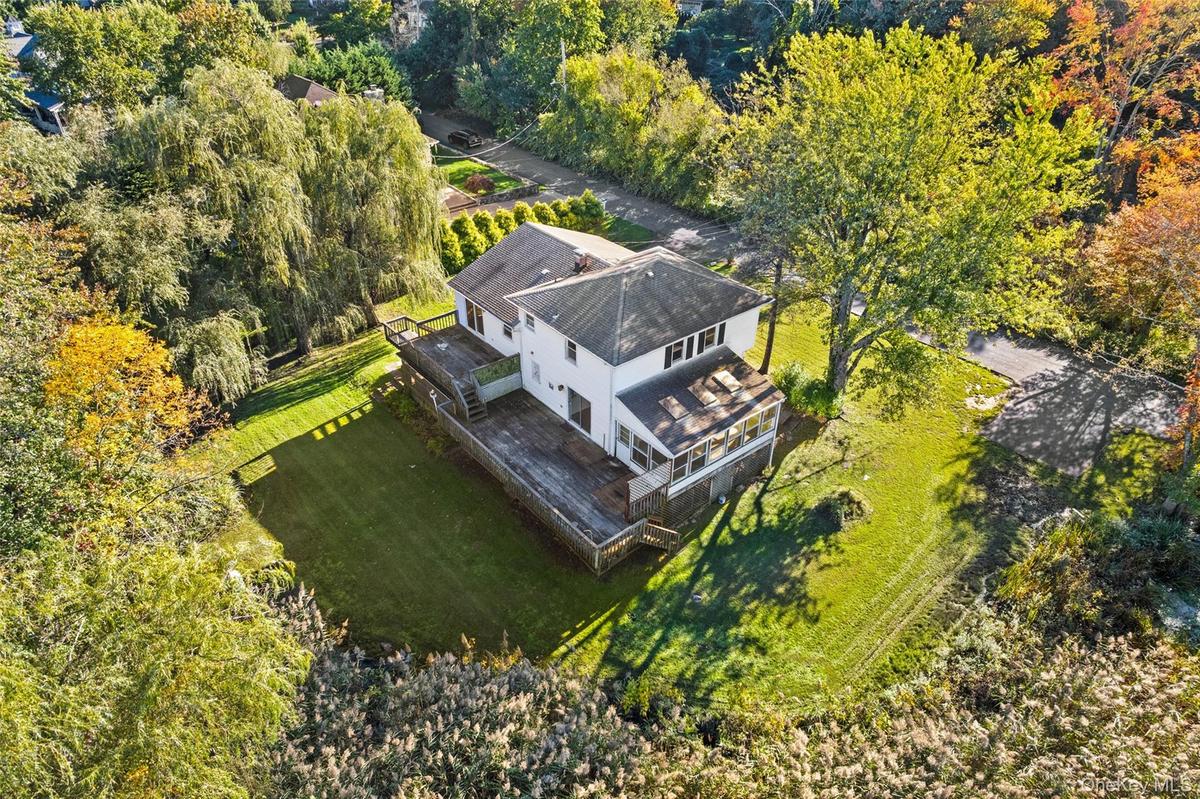 The expansive setting invites imagination—whether enhancing the existing residence or exploring the property's broader potential.