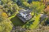 The expansive setting invites imagination—whether enhancing the existing residence or exploring the property's broader potential.