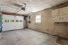 The attached garage, driveway and additional parking area on the opposite side of the property provide generous off-street parking, along with conveni