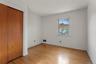 A light-filled bedroom offering flexibility for family, guests or a home office.
