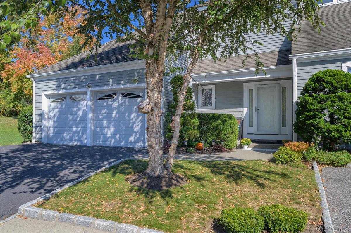 Coveted end unit in the back of the complex, with a 2 car garage!