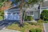 Coveted end unit in the back of the complex, with a 2 car garage!