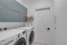 Laundry Room off garage and guest wing.