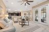 French doors leading to the patio and pool