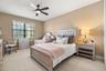 Upstairs guest bedroom with walk in closet