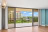 Large sliding doors from living/dining room. with easy close hurricane shutters