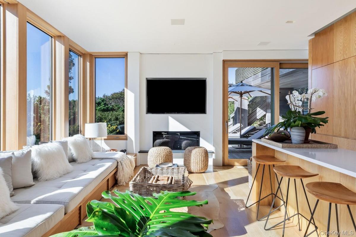 Living Room with fireplace and TV