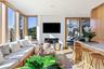 Living Room with fireplace and TV