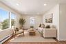 Virtually staged to show possible furniture placement
