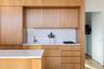 Kitchen with Gas Cooktop and Wood Cabinets