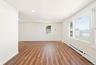 Upper-level living space with large picture window