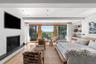 With gas fireplace, European oak hardwood floors and view of the ocean