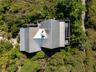 overhead view custom made  invarimate metal roof surrounded by National Seashore.