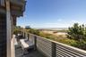 Upper deck made with 2 x 4 mahogony and custom made slats with view of the beach