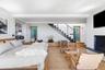 With custom built-ins and gas fireplace