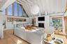 With Noguchi light fixture and view of the fireplace.