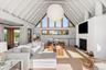 With view of the fireplace and Reilly windows at the back of the structure.