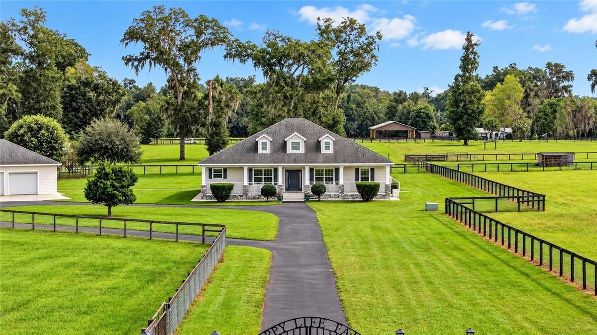 Custom-Built Farmhouse on 13.58 acres.