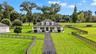 Custom-Built Farmhouse on 13.58 acres.