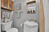 A Single Sink & Vanity And Yet Another Kohler Extended Height Commode!
