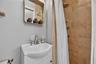 This Is A Full Bath As Well, Including A Walk-In Shower With Tiled Walls!