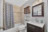 Tub/Shower Combo Tiled Walls & Another Kohler Extended Height Commode! This Bath Also Serves As The Always Advantageous Pool Bath!