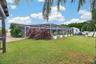 You Have A Large, Green Backyard Here Between The Home & The Seawall!!