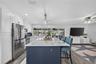 Large Center Island With Quartz Counter & A Roomy Sized Breakfast/Snack Bar!