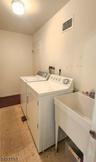 Main level laundry room w sink
