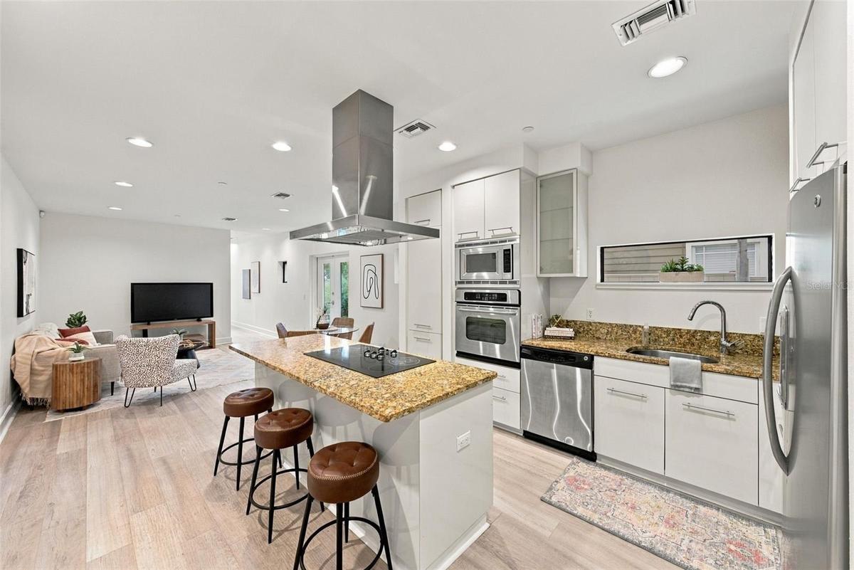 island and stainless steel appliances