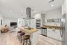 island and stainless steel appliances