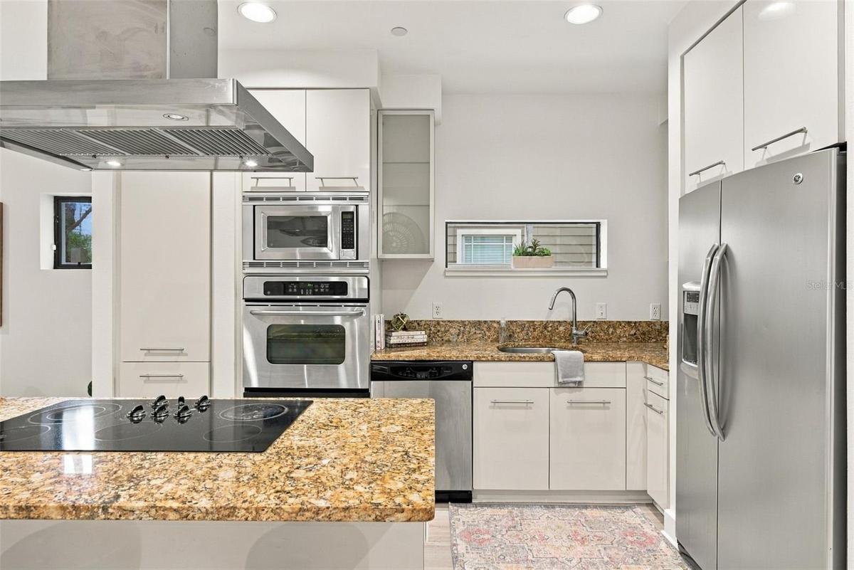Kitchen features European cabinetry,