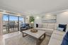 Living Room with Sliding Glass Doors to the Waterfront Balcony