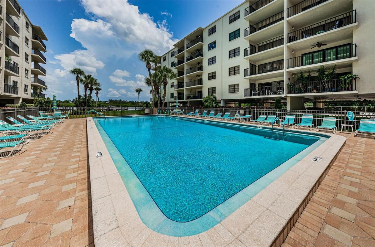 Shimmering Inground Heated Community Pool overlooking the Water!