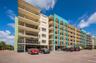 Golden Shores Condos on the north entrance leading up to the Unit