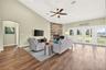 Open concept living area enjoys natural light and beautiful views of the east pastures.