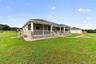 Expansive rear screened porch.