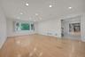 Living Room with recessed lighting and gleaming hardwood floors