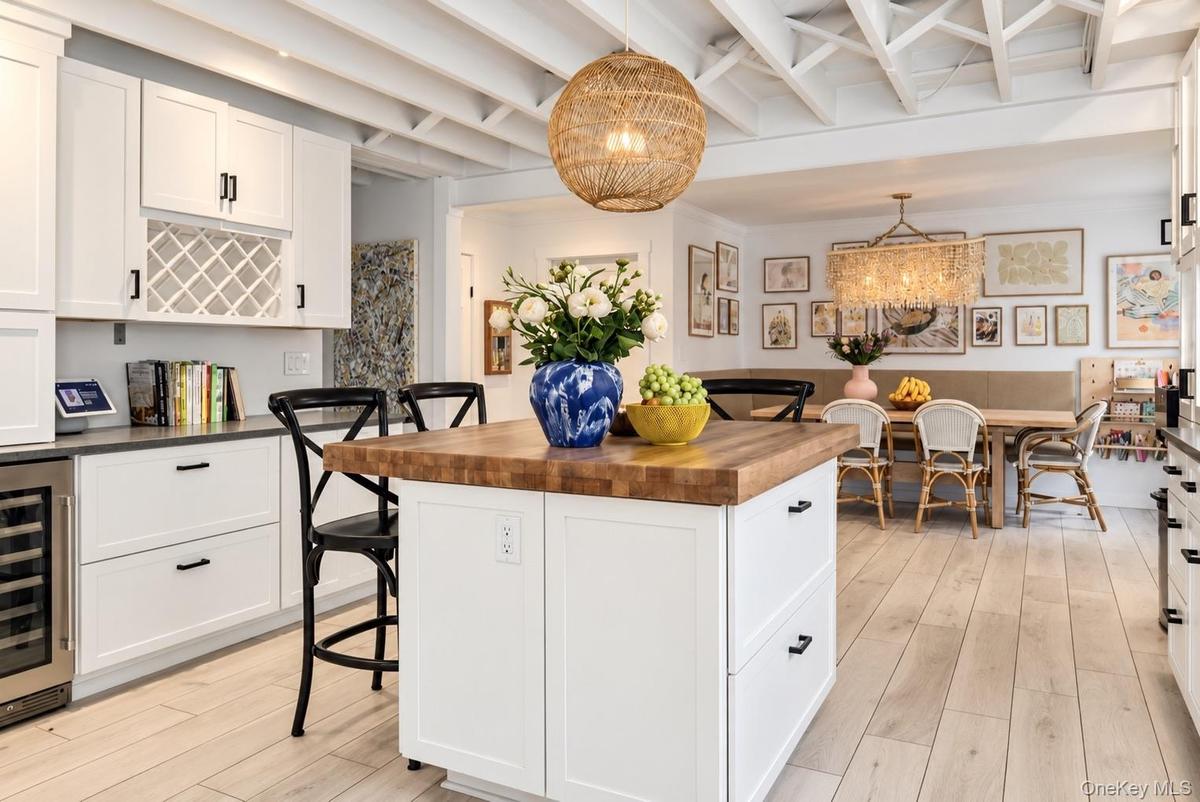Renovated kitchen with island and custom cabinetry