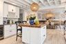 Renovated kitchen with island and custom cabinetry