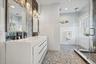 Dual vanity with integrated sinks and modern hardware