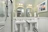 Primary Bath with dual sinks and skylight