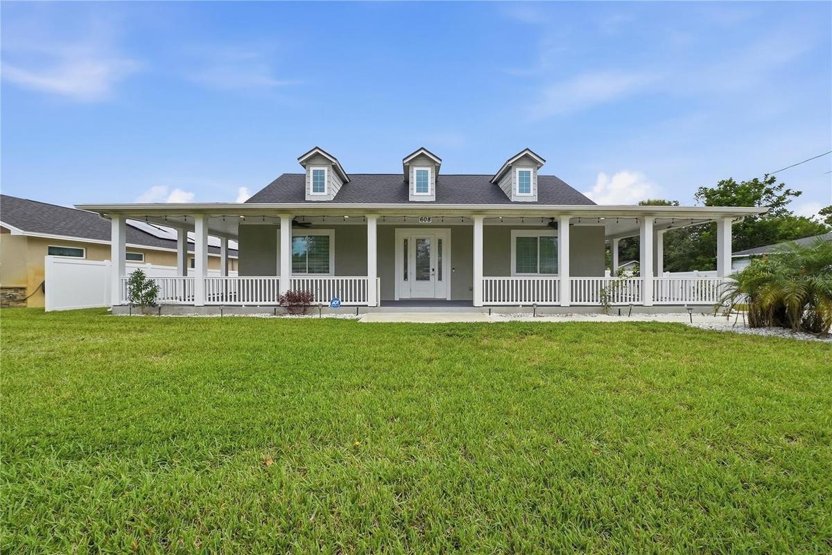 Front Exterior View with beautiful wrap around porch