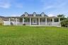 Front Exterior View with beautiful wrap around porch