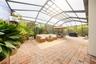Expansive screened patio with conservation views and potential for a custom pool,
